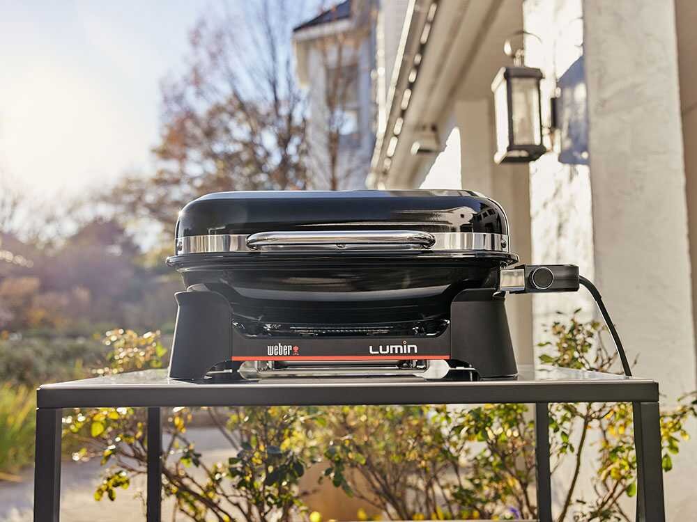 Weber Lumin Black 1502045 – Barbacoa eléctrica portátil – Parrilla 49 x 33 cm